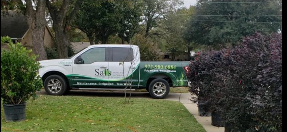 Sal's branded crew truck parked at a North Texas job site